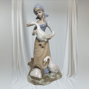 "Girl With Two Gooses" Porcelain Figurine.NO BRAND